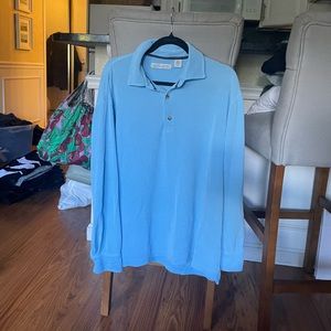Greg Norman polo shirt.